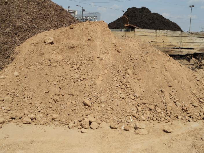 Adams Nursery sells top soil in bulk.  The soil is a sandy loam mixture great for landscaping and gardens. Top soil is sold by the scoop which is equal to 1/2 cu yd.
