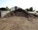 Brown Hardwood mulch is a good top dressing for shrub beds and around trees. This is one of two types of bulk mulch sold at Adams Nursery & Landscaping in Paragould.  It is sold by the scoop which is equal to 1/2 cu yd.