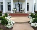 We created this white flower theme landscape to showcase the entry way to a home in Rector. We worked closely with the homeowner to bring her vision to life.  